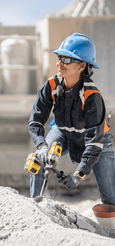 woman wearing a hardd hat working