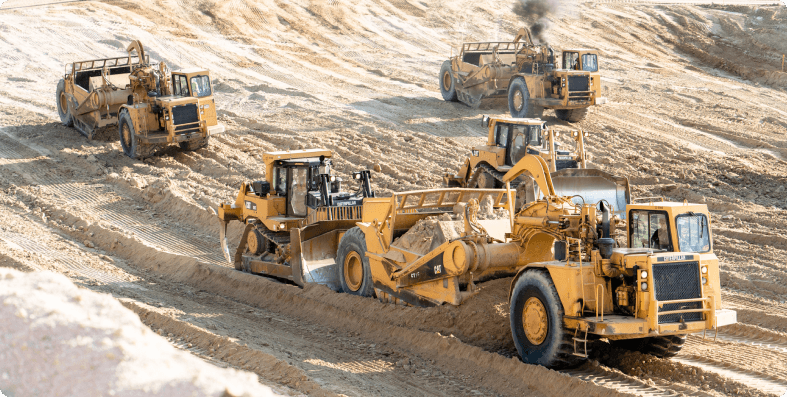 Large earthmoving machines at work